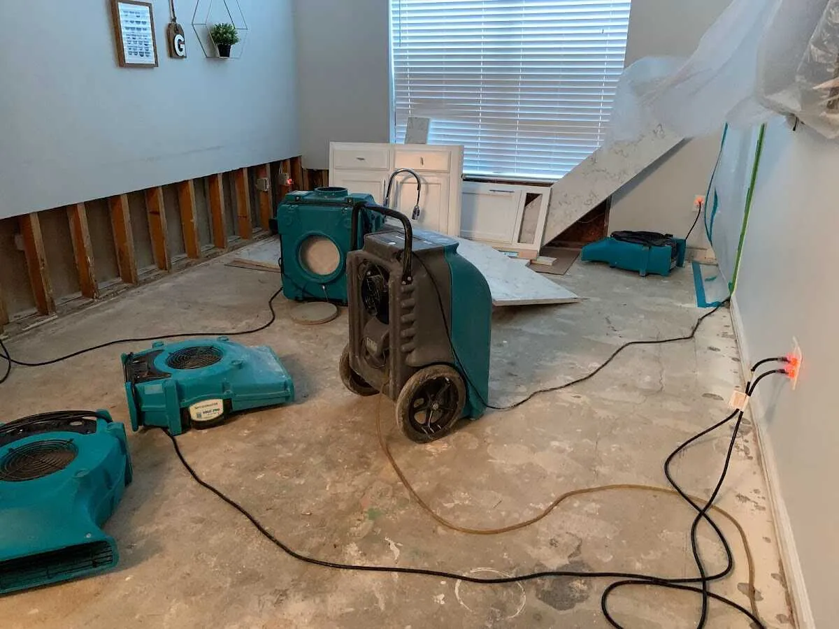 Dehumidifier in flood-cut room for Water Damage Restoration in East Hartford